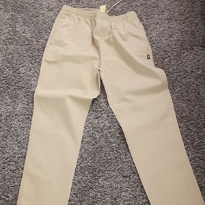 Tan stussy beach pants.